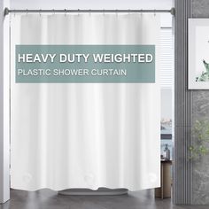 a white shower curtain with the words heavy duty weighted plastic shower curtain in front of it