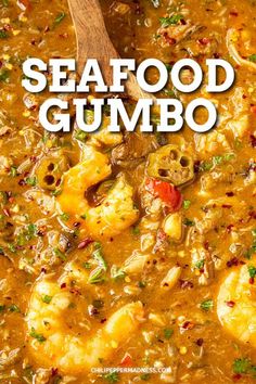 seafood gumbo in a white bowl with a wooden spoon on the side and text overlay that reads seafood gumbo