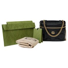 Amazing​ ​Gucci​ ​GG​ ​Mini​ ​shoulder​ ​bag​ ​in​ ​black​ ​quilted​ ​leather,​ ​gold​ ​metal​ ​trim,​ ​chain​ ​handle​ ​in​ ​gold​ ​metal​ ​for​ ​a​ ​hand​ ​or​ ​shoulder​ ​or​ ​crossbody​ ​carry Quilted​ ​leather​ ​is​ ​an​ ​emblematic​ ​material​ ​of​ ​the​ ​House,​ ​thanks​ ​to​ ​its​ ​very​ ​soft​ ​finish.​ ​The​ ​textured​ ​geometric​ ​pattern​ ​characterizes​ ​a​ ​selection​ ​of​ ​small​ ​leather​ ​goods,​ ​including​ ​this​ ​mini​ ​black​ ​handbag.​ ​The​ ​model​ ​proudly​ ​features​ ​th Black Gucci Bag, Black Handbag, Louis Vuitton Shoulder Bag, Metal Trim, Mini Shoulder Bag, Black Quilt, Small Accessories, Quilted Leather, Small Leather Goods