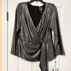 Gorgeous Grey Sparkly Blouse! Super Lightweight! Glamorous V-neck Cocktail Tops, Silver V-neck Top For Fall, Glamorous Metallic Shimmer Blouse, Long Sleeve Blouse For Fall Holiday Party, Long Sleeve Blouse For Holiday Party In Fall, Elegant Evening Blouse For Holidays, Elegant Holiday Evening Tops, Fall Holiday Party Long Sleeve Blouse, Metallic V-neck Top For Evening