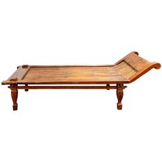 a wooden bed with two legs and a tray on the bottom that is attached to it