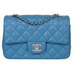 Chanel Blue Quilted Lambskin Rectangular Mini Flap Bag Product Details Xupes Ref: HB5683 Brand: Chanel Model: Rectangular Mini Flap Bag Type: Shoulder, Crossbody Serial Number: 27904097 Age: 2019 Accompanied By: Chanel Dust Bag, Box, Authenticity Card Colour: Blue Hardware: Silver Material(s): Lambskin Leather Specification Height: 12cm Width: 20cm Depth: 7cm Strap Drop: 56cm Interior: Blue Leather Closure: Turn Lock Country of Origin: France Authenticity Details: Serial Sticker, Authenticity Card Condition Condition Rating: Excellent Exterior Condition: The exterior is in excellent condition with minimal signs of use. Interior Condition: The interior is in excellent condition with minimal signs of use. Hardware Condition: The hardware is in excellent condition with gentle signs of use. Co Light Blue Leather Rectangular Bag, Light Blue Rectangular Leather Bag, Classic Blue Flap Bag For Everyday, Classic Blue Rectangular Bag, Classic Blue Crossbody Flap Bag, Blue Rectangular Flap Bag, Blue Leather Rectangular Bag, Classic Blue Rectangular Shoulder Bag, Blue Rectangular Leather Bag