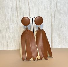 brown faux leather fabric earrings. Elegant Brown Leather Earrings, Chic Brown Earrings For Party, Trendy Brown Earrings, Trendy Brown Earrings For Party, Trendy Brown Party Earrings, Chic Brown Drop Earrings, Fabric Earrings, Faux Leather Fabric, Rochester Ny