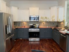 the kitchen is clean and ready for us to use in its new owner's home