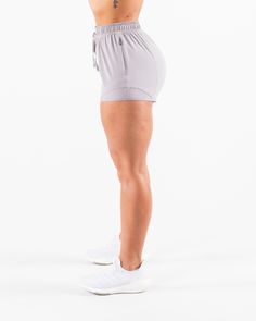 Swift Short 4.5" - Plum Glow – Alphalete Athletics Athleisure Shorts With 4-way Stretch And Functional Drawstring, Stretch Running Bottoms With Functional Drawstring, Gym Bottoms With Functional Drawstring And Short Length, Athleisure Shorts With Functional Drawstring And 4-way Stretch, Stretch Bottoms With Drawstring For Training, Stretch Drawstring Bottoms For Training, Gray Drawstring Workout Bottoms, Training Bottoms With Drawstring, Short Shape, Running Bottoms With Elastic Side Panels