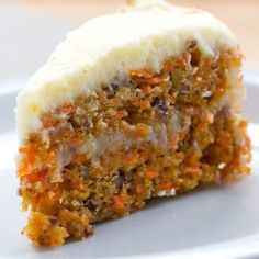 a piece of carrot cake on a white plate