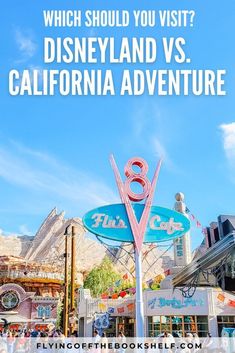 an amusement park with the words which should you visit? disneyland and california adventure?