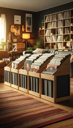 a row of bookshelves in a living room with a rug on the floor