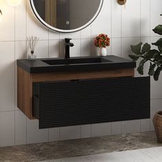 a bathroom with a sink, mirror and potted plant