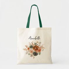 a tote bag with an image of flowers and the words annnall on it