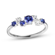 This gorgeous ring for her features a mesmerizing array of round-cut blue and white lab-created sapphires. The ring is set in classic sterling silver. White Lab, Blue Sapphire Ring, Silver Prices, Sapphire Stone, Rings For Her, White Ring, The Ring, Sterling Ring, Blue Sapphire