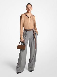 These wide-leg trousers combine timeless tailoring elements, like front pleats and crisp leg creases, with stretch-infused virgin wool sourced from an Italian mill. A high-rise fit evokes a strong feminine aesthetic. Balance its soft hand and languid drape with pointed-toe heels. Made in Italy. Luxury Wide Leg Pants For Business Casual, Luxury Wide Leg Dress Pants For Work, Luxury Tailored Wide Leg Pants For Business Casual, Luxury Wide Leg Pants With Belt Loops For Work, Luxury Tailored Wide Leg Pants For Workwear, Luxury Tailored Wide Leg Pants For Office, Luxury Wide Leg Pants For Office In Fall, Luxury Wide Leg Pants For Fall, Luxury High-waisted Wide Leg Pants For Fall