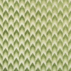 an abstract green and white background with wavy lines in the shape of shapes on fabric