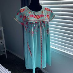 New Without Tags Never Worn Blue Floral Embroidered Summer Dress, Turquoise Casual Short Sleeve Dress, Casual Turquoise Short Sleeve Dress, Blue Floral Embroidery Mini Dress For Vacation, Blue Floral Embroidered Mini Dress For Vacation, Casual Blue Mini Dress With Floral Embroidery, Blue Floral Embroidery Dress For Vacation, Casual Blue Floral Embroidered Dress, Large Dress