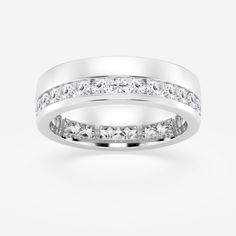 a white gold wedding ring with princess cut diamonds on the side and channel set in the middle