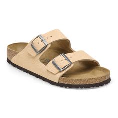 An icon of timeless design and legendary comfort the Arizona sandal has been defining style since 1973. Grained nubuck leather brings distinct character to the classic two-strap look. Complete with legendary BIRKENSTOCK design elements like a contoured cork-latex footbed for the ultimate in support. Contoured cork-latex footbed creates custom support with wear Grained nubuck leather upper Suede footbed lining helps keep you comfortable Flexible EVA sole Two adjustable straps with metal pin buckl Beige Birkenstock, Birkenstock Styles, Two Strap Sandals, Birkenstock Arizona, Eva Sole, Nubuck Leather, Natural Leather, Signature Style, Fashion Store