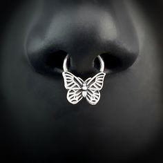 "Butterfly Septum, Moth Septum Hoop, Butterfly Septum Jewelry, Sterling Silver Septum, Rose Gold Septum Piercing, Gothic, Witchy, Goth, Punk WHAT IT IS AND WHY YOU WANT IT: The Butterfly on this septum ring is individually hand molded using solid fine silver in a mold I personally made just for this process. Then it is soldered to a solid sterling silver hoop. Choose the gauge and diameter you prefer. Each piece is custom made to order so if you like this style but need something changed, please Butterfly Septum Ring, Handmade Sterling Silver Septum Ring, Butterfly Septum, Gold Septum Piercing, Cute Septum Rings, Gold Septum, Septum Piercing Jewelry, Septum Hoop, Witchy Goth