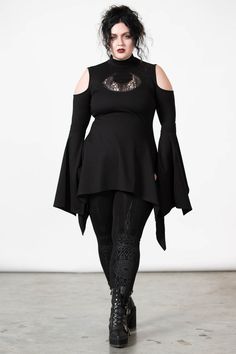 MOONSHINE.- Soft, super stretch fabric.- Statement crescent moon lace cut-out.- Cold shoulder.- High neck.- Hanky hem.- Long line.- Button closure.Model is 5ft 5 and wears a size L.with KILLSTAR branding, 60% Rayon, 35% Nylon, 5% Elastane. Plus Size Rogue Cosplay, Soft Goth Outfits Plus Size, Whimsical Goth Fashion Plus Size, Adult Goth Fashion, Plus Size Witch Fashion, Plus Size Gothic Fashion, Goth Outfits Plus Size, Alternative Outfits Plus Size, Plus Size Goth Clothes