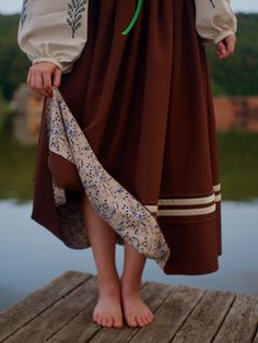 Embrace timeless elegance with our handcrafted skirt, featuring a rich brown fabric with a delicate floral lining that adds a touch of softness. Paired with intricate embroidery on the sleeves, this piece captures the essence of nature and tradition. Perfect for those who appreciate vintage-inspired, artisanal fashion. 🌿 Enter your waist size and height when ordering and we will sew it perfectly for you! Fantasy Sewing, Artisanal Fashion, Skirt Embroidery, Embroidery Skirt, Artisan Fashion, Brown Skirt, Brown Skirts, Intricate Embroidery, Brown Fabric