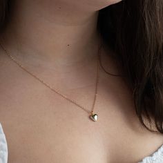 This dainty piece features a petite heart pendant, radiating with charm and elegance. Perfect for adding a subtle touch of love and sophistication to any outfit, this necklace is a timeless symbol of affection and grace. Wear it close to your heart as a reminder of the beauty of love in its simplest form. ………………………………… Details: Pendant is Gold Plated or Silver Plated, measuring 9mm x 9mm Chain is 14k Gold Filled or Sterling Silver Average necklace length is 18" About Your Jewelry If you are not Dainty Heart Charm Jewelry For Everyday, Minimalist Heart Charm Jewelry For Everyday, Minimalist Everyday Jewelry With Heart Charm, Dainty Everyday Charm Necklaces For Mother's Day, Minimalist Everyday Charm Necklace With Heart Charm, Minimalist Everyday Necklace With Heart Charm, Minimalist Everyday Charm Necklace With Heart, Classic Charm Necklaces For Mother's Day, Classic Everyday Charm Necklaces For Mother's Day