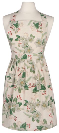 a white dress with green and red flowers on it