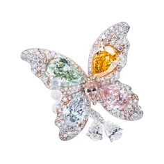 This piece is available for custom order only. A masterfully crafted, whimsical butterfly ring featuring fancy colored blue, green, pink and orange diamonds from Vihari Jewels. The ring is set with white diamonds in 18K White Gold and 18K Rose Gold with a total carat weight of 9.21 carats. No details were spared. The butterfly diamond ring is captivating from all angles. Purchase includes Vihari Jewels ring box and original GIA grading report(s). Vihari Jewels adheres to the Kimberley Process Ce Butterfly Diamond Ring, Diamond Butterfly Ring, Antique Cocktail Ring, Fancy Diamond Ring, Orange Diamond, Fancy Light, Pink Diamond Ring, Diamond Butterfly, Fancy Lights