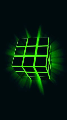 a green glowing cube on a black background