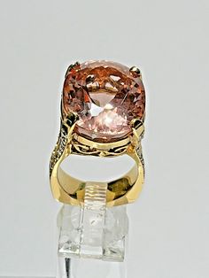 INVEN#SOUPP This lisitng is for a fabulous cocktail ring!! Very comfortable to wear and will grab everyone's attention ! It is 18k pink gold, with a total of 36 diamonds and a 28.5 carat morganite, oval brilliant cut! Size: 6 Total weight: 22 grams Please carefully view the photos as they are part of the description. All sales are final. Shipping quotes are in the US only, and includes insurance, tracking, and delivery confirmation. Bid with confidence. Seller is a 25-year eBay veteran with a pr Luxury Pink Diamond Ring For Formal Occasions, Formal Morganite Rings In Pink Gold, Morganite Pink Gold Rings For Formal Occasions, Luxury Pink Topaz Ring, Luxury Pink Morganite Jewelry, Formal Rose Gold Topaz Ring With Accent Stones, Formal Morganite Pink Gold Rings, Formal Pink Gold Morganite Rings, Morganite Pink Gold Rings With Accent Stones