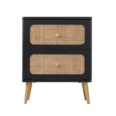 the side table with two drawers is black and has wicker panels on each drawer