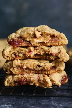 a stack of cookies sitting on top of a cooling rack