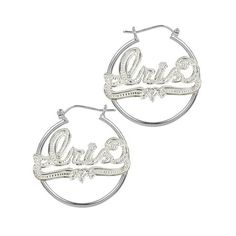 These fashionable nameplate hoop earrings are perfect for any occasion and everyday wear. You have up to ten characters to personalize your nameplate with the name of a loved one or your own. This sweetheart style features an eye-catching design of a smooth hoop earring and shimmering beaded rhodium nameplate that sparkles and wows. A glistening, winding underline with a heart in the center completes these earrings and makes them the perfect gift for a loved one. These nameplate hoop earrings ar Personalized Sterling Silver Hoop Jewelry, Silver Hoop Earrings For Personalized Gift, Silver Small Hoop Earrings For Birthday, Silver Small Hoop Jewelry For Birthday, Custom Name Silver Hoop Earrings As A Gift, Personalized Silver Metal Hoop Earrings, Personalized Metal Hoop Earrings For Anniversary, Personalized Silver Hoop Earrings With Name, Custom Name Silver Hoop Earrings For Anniversary