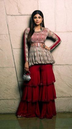 Sharara's are in fashion, and is also perfect silhouette and great way to give your kurta's a stylish kick. Find out Layered Sharara Designs on Threads. Shilpa Shetty Outfits, Sarara Dress, Gharara Designs, Sharara Designs, Shilpa Shetty, Sharara Suit