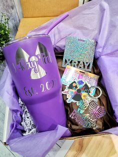 a purple gift box filled with personalized items