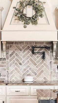 a stove top oven sitting inside of a kitchen next to a microwave and countertop