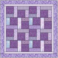 a purple and white quilt with squares on it