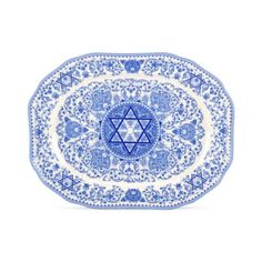 a blue and white plate with an image of the star of david in the center