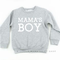 Mama's Boy - Kid's Sweatshirt All LMSS shirts are unisex sizing. For this particular collection, sizes 2T through 7 are Rabbit Skins Brand. The 5/6 fits similar to a 5T and the 7 fits similar to a youth XS or S. The Youth M-XL are Hanes brand and fit mostly true to size, but when in doubt, size up. SHIPPING DETAILS: - All shirts are shipped via USPS First Class Mail (2-5 business days for US orders) from Idaho - Shipping upgrades available at checkout CONNECT ON SOCIAL MEDIA: Instagram: @LittleM Trendy Kids Outfits, Graphic Sweaters, Layer Top, The Youth, Trendy Kids, Kids Sweater, Sweater Design, Mama Shirt, Kids Sweatshirt