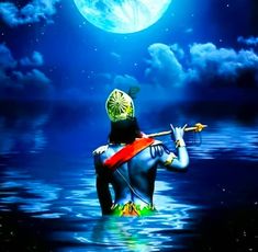 a man standing in the water with a flute under a full moon and blue sky