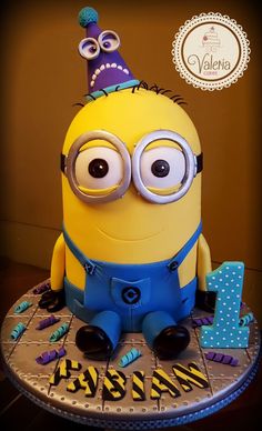 a birthday cake that looks like a minion