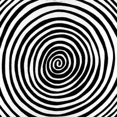 an abstract black and white pattern with spirals in the center, as if it were optical art