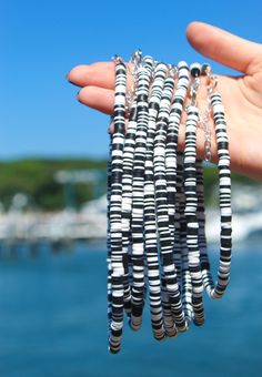 Black and White beaded choker! Check out our handmade choker collection! We have so many unique and different chokers to choose from! Handmade Choker With Round Beads For Beach, Handmade Black Choker For Beach, Handmade Black Choker For The Beach, Handmade Chokers, Black Choker, Beach Inspired, Beaded Choker, Clay Jewelry, Handmade Shop