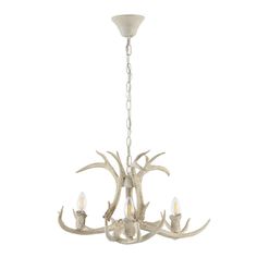 a white chandelier with antlers hanging from it's center and four lights on each side