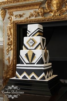 a black and white cake sitting on top of a table