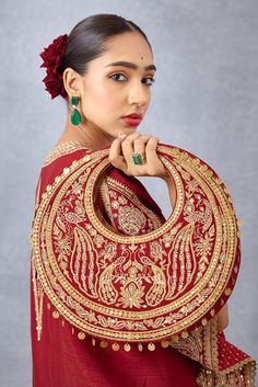 Bright red hand embroidered hobo bag with heavy mirror work in raw silk.
Type: Embroidered
Composition: Raw Silk
Color: Red
Other Details: 
Tassel detail
Hand work
 - Aza Fashions Festive Red Embroidered Bag, Traditional Red Embroidered Shoulder Bag, Traditional Bags With Resham Embroidery For Festive Occasions, Traditional Gold Embroidery Potli Bag, Traditional Mirror Work Potli Bag For Festive Occasions, Traditional Festive Potli Bag With Mirror Work, Red Festive Bag With Zari Work, Bollywood Style Festive Bags With Resham Embroidery, Festive Red Shoulder Bag With Handwork