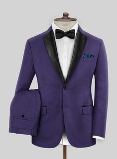 Add a touch of sophistication to your wardrobe with our Napoleon Violet Wool Tuxedo Suit. This classic violet suit is made from a wool blend, ensuring durability and breathability. It is the perfect choice for making a statement at a close friend or cousin's wedding.     Featuring satin lapel, matching satin covered buttons and gentle texture at its surface, our tuxedo is a subtle fashion-forward take on a traditional tailoring.     Look Includes   Napolean Violet Wool Fabric  Two Button Tuxedo Subtle Fashion, Grey Tweed Suit, Herringbone Tweed Jacket, Best Dressed Man, Herringbone Tweed, Beautiful Suit, Black Tuxedo, Tweed Suits