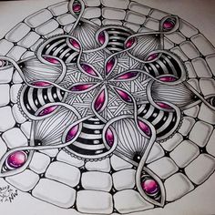 a drawing of a flower with pink stones in the center and an intricate design on it