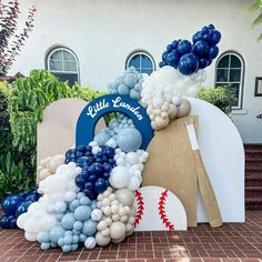 balloons are arranged in the shape of baseballs and bats