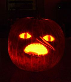 a pumpkin with an angry face carved into it