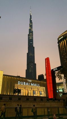 the burjdah mall is lit up at night