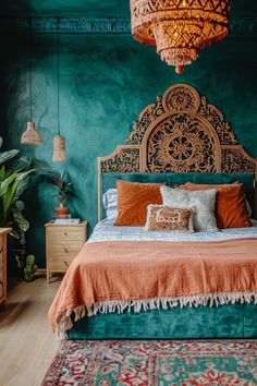 a bedroom with green walls and an ornate headboard on the bed, surrounded by colorful rugs